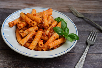  Pasta bolognese .Italian home made meal Fresh   maccheroni pasta with tomato sauce, basil, herbs ,parmesan cheese ,fresh cherry tomatoes and parsley on wooden background. Kitchen Poster 