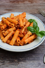 Pasta bolognese .Italian home made meal Fresh   maccheroni pasta with tomato sauce, basil, herbs ,parmesan cheese ,fresh cherry tomatoes and parsley on wooden background. Kitchen Poster 