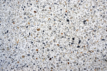 Textured Surface of Natural Stone Aggregates in Gray and White Tones for Background Use