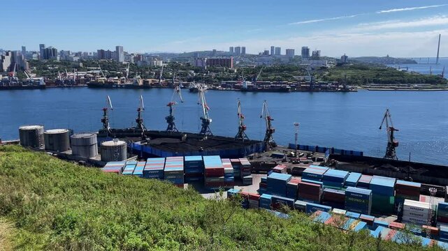 Cranes working in the port ovf Vladivostok Russia. Logistic hub on the Japan sea in Primorsky region