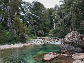 Casa de Piedra clear river flowing through forest