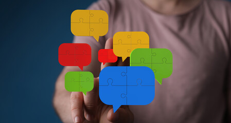 Teamwork, problem-solving, and communication.  Visual of puzzle pieces forming speech bubbles.