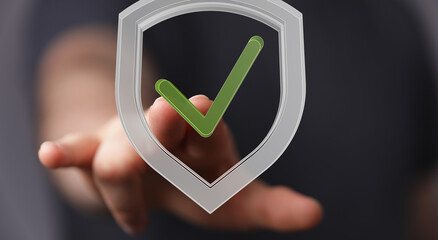 Hand pointing at a digital shield with a checkmark, symbolizing secure data and approved access.