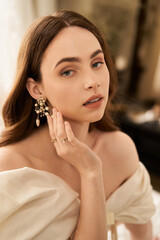 Charming young woman embodies vintage elegance in exquisite dress and accessories