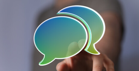 Abstract image of two speech bubbles, representing communication and conversation.
