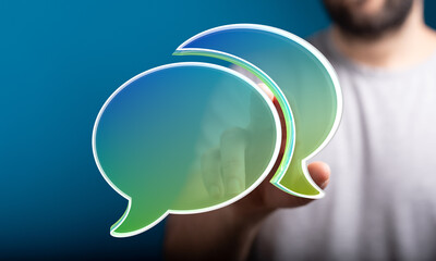 Abstract image of person interacting with digital speech bubbles, representing communication,...