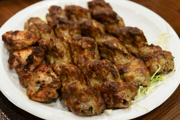 Delicious grilled Beef (Yak) on a white plate.