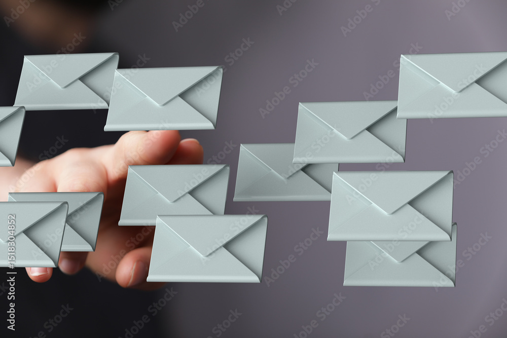Aufkleber Hand interacting with digital emails, illustrating inbox management challenges.