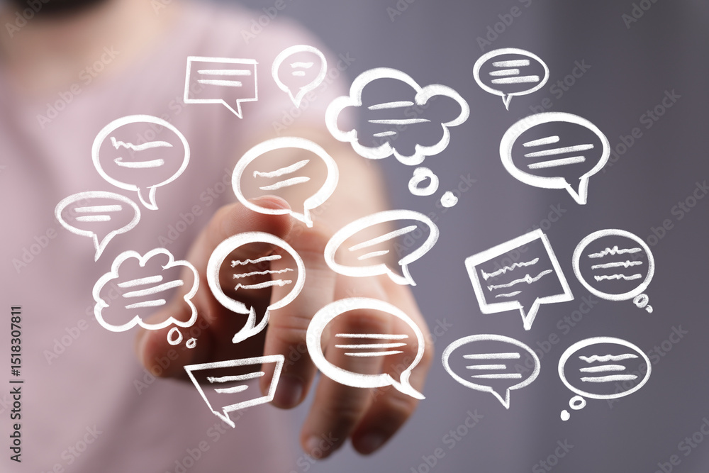 Poster hand interacting with a digital interface showing multiple speech bubbles, representing communicatio