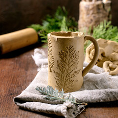 Decorating of raw clay ceramics