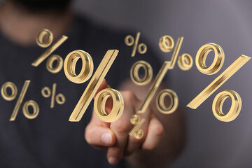 Person interacting with 3D percentage symbols.  Great for finance, sales, discount concepts.