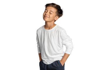 Relaxed young boy in casual outfit with eyes closed and hands in pockets, smiling peacefully. Isolated on transparent background