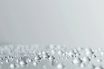 Detailed Color Image of Front View of Liquid Drops on Surface