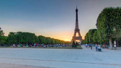 Eiffel Tower seen from Champ de Mars at sunset timelapse, Paris, France