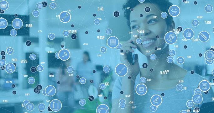 Image of data processing over african american businesswoman using smartphone in office