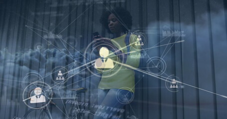 Image of network of connections over clouds and african american woman with smartphone and bike