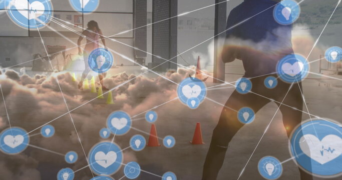 Image of network of connections over clouds and african american woman and man at gym