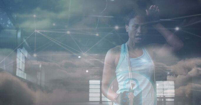 Image of network of connections and sky with clouds over african american woman exercising