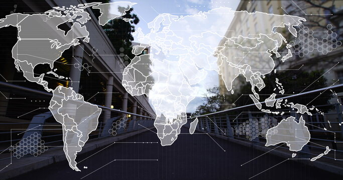 Image of world map and processing data over pedestrians crossing bridge in city