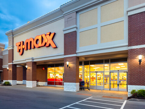 New Hartford, NY- Jun 25, 2024: Night view of TJ Maxx store entrance. T.J. Maxx is an American department store chain, selling at prices generally lower than other major similar stores