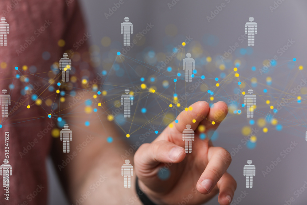 Poster hand interacting with a digital network of people, symbolizing connection and communication.