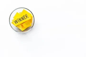 Gordijnen Winner on piece of paper in glass jar, top view. Luck and success concept. © 9dreamstudio