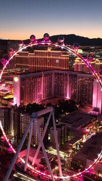 Sunset High Roller At Las Vegas Nevada United States. Bird Eye View Of Stunning Ferris Wheel In A Amusement Park. Building Metropolitan Landscape Skyscrapers Awesome. Metropolitan Town.