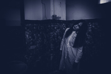 Portrait of asian woman make up ghost face with blood,Horror scene,Scary background,Halloween...
