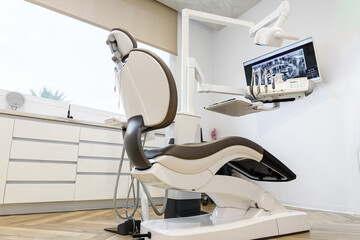 Modern dental clinic showing equipment and a comfortable patient chair