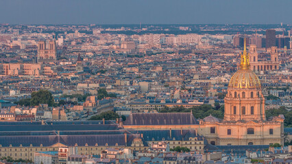 Aerial view of a large city skyline at sunset timelapse. Top view from the Eiffel tower. Paris,...