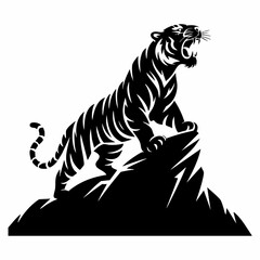 Roaring tiger on mountain peak silhouette