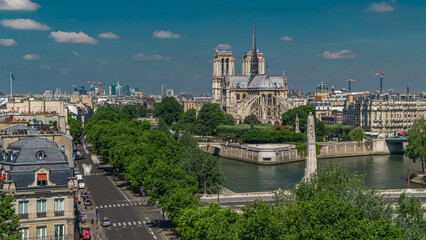 Paris Panorama with Cite Island and Cathedral Notre Dame de Paris timelapse from the Arab World Institute observation deck. France.