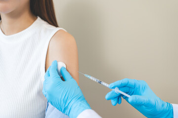 Health care, corona virus, hand of woman nurse, doctor giving syringe vaccine, injection dose on...