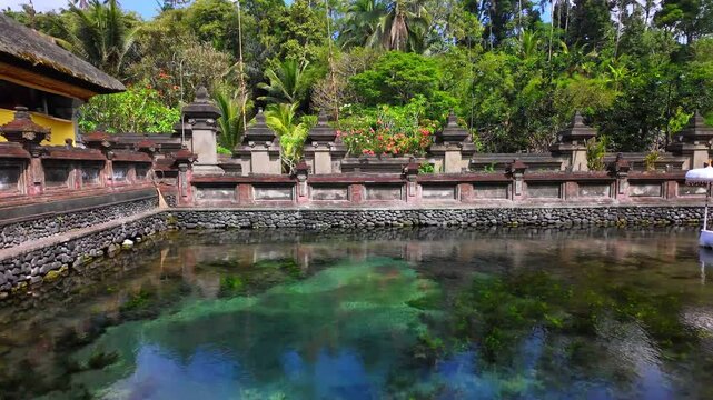 Picturesque view of pool spring water in Pura Tirta Empul Temple on Bali, Indonesia