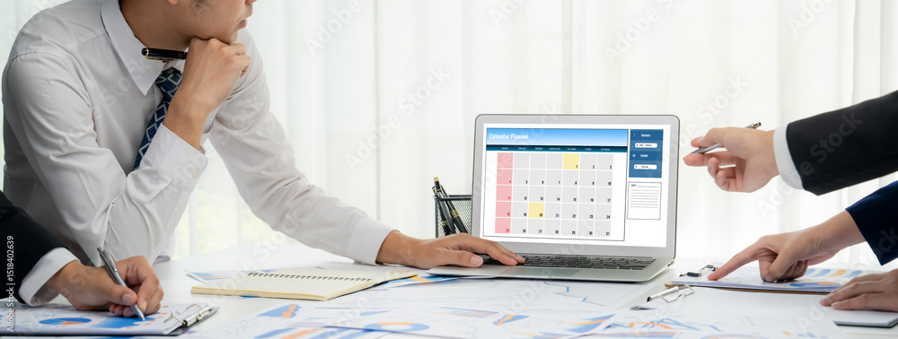 Poster calendar on computer software application for brisk schedule planning for personal organizer and onl