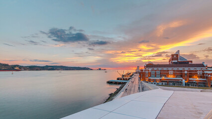 Sunset panorama with the Padrao dos Descobrimentos Monument to the Discoveries timelapse in Lisbon