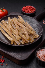 Food, snacks or jerky made from dried dehydrated salted fish with spices. Snacks fish