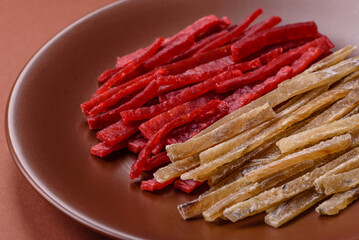 A set of jerky or snacks of chicken and fish with salt and spices
