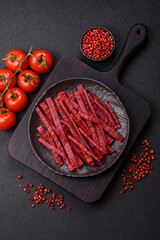 Jerky or dried chicken and cherry snacks. Dehydrated, dried snacks for beer