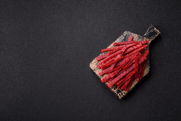 Jerky or dried chicken and cherry snacks. Dehydrated, dried snacks for beer