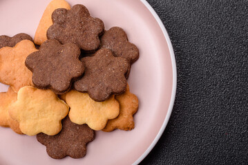 Sweet crispy biscuit with cocoa flavor, baking at home. Biscuit as a dessert