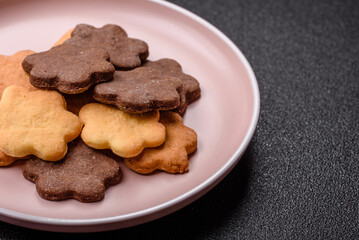 Sweet crispy biscuit with cocoa flavor, baking at home. Biscuit as a dessert