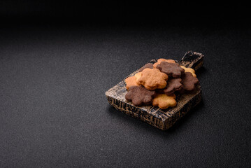 Sweet crispy biscuit with cocoa flavor, baking at home. Biscuit as a dessert