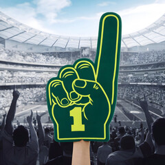 Green number one foam finger at a stadium