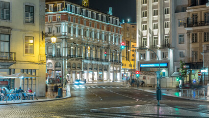 Obraz premium Dom Joao da Camara Square from Praca Dom Pedro IV or Rossio Square in Lisbon downtown night timelapse.