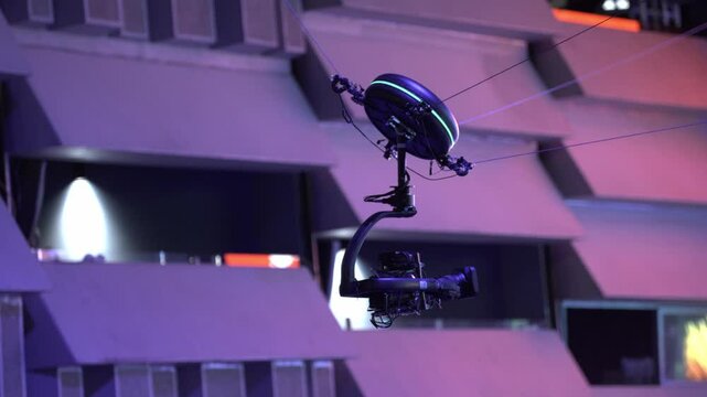 Tv camera shooting event. flying camera
