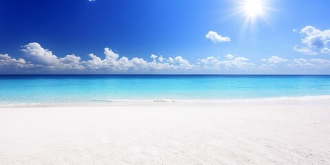 Fototapeta premium Tranquil beach with white sand and clear blue water under sunny sky 