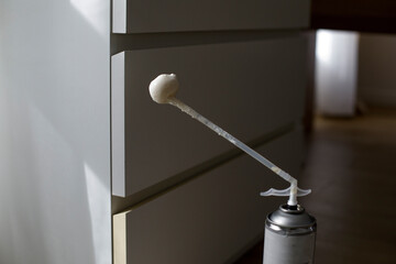Construction foam insulation spray can, dried polyurethane foam sprayer adhesive sealant. Sealant...
