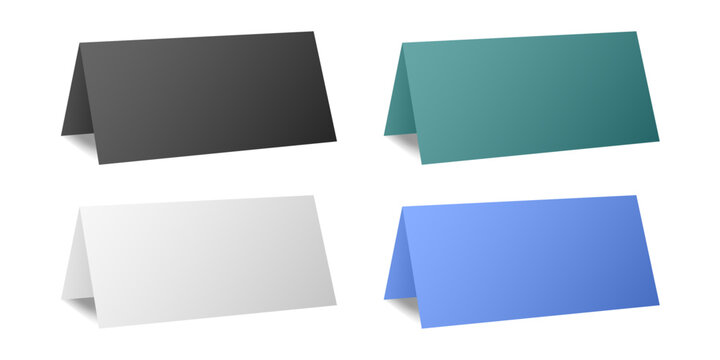 Set of table cards. White, black, teal green and blue bent sheets. Tent table card, nameplate