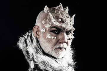 Man with devil horns. Mysterious man, horned devil demon. Mythical devil portrait with black horns....